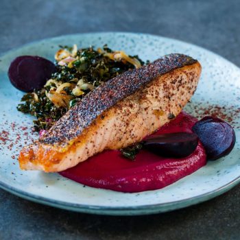 Sumac spiced salmon with beetroot puree and fried kale